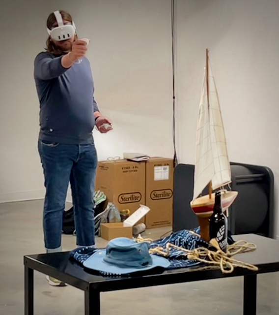 A user drawing a still life in VR
